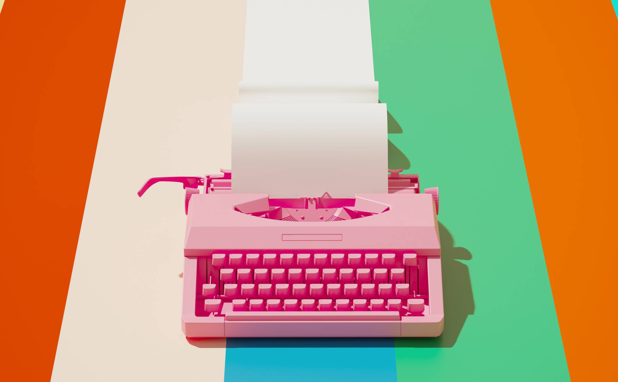 A pink typewriter against a brightly colored stripe background 