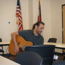 Richie Castro teaching teens songwriting at Anythink Commerce City